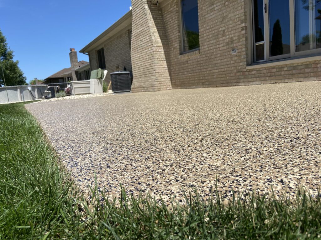 Protecting your patio concrete with a polyurea flake coating also creates a beautiful livable space outdoor.