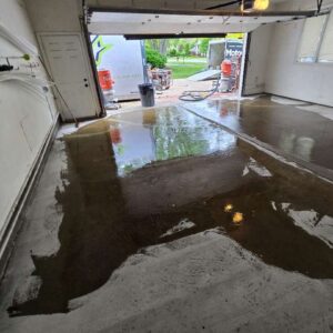 Old garage concrete floor – 10 – Patch and flood Orchard Trail Drive michigan (1)